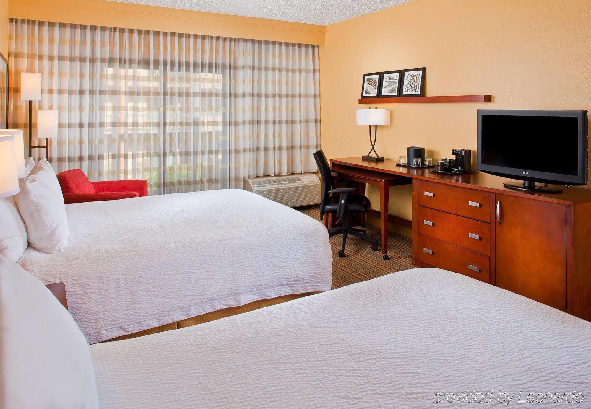 Courtyard By Marriott Orlando Airport Hotel Екстериор снимка